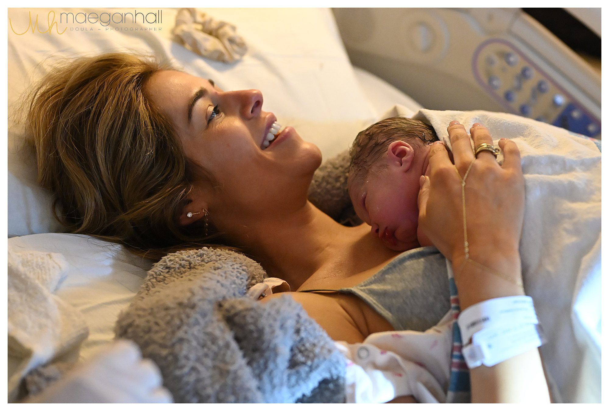 Peaceful postpartum scene with baby nursing for the first time
