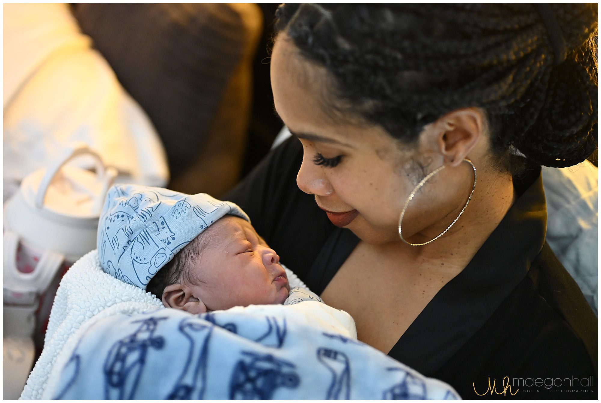 mom looks at her baby pouting